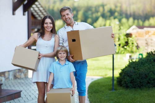 Local movers organising household items for packing and transport
